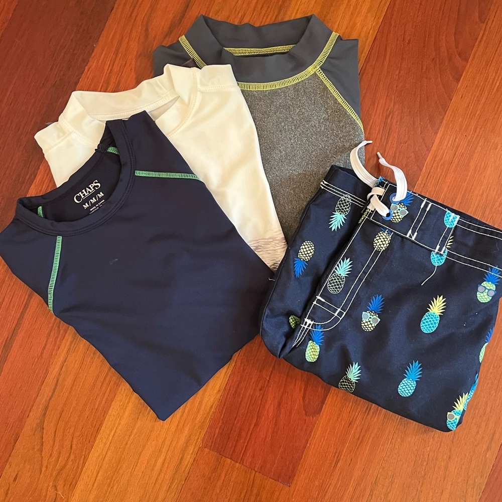 Boys swim trunks and three swim shirts